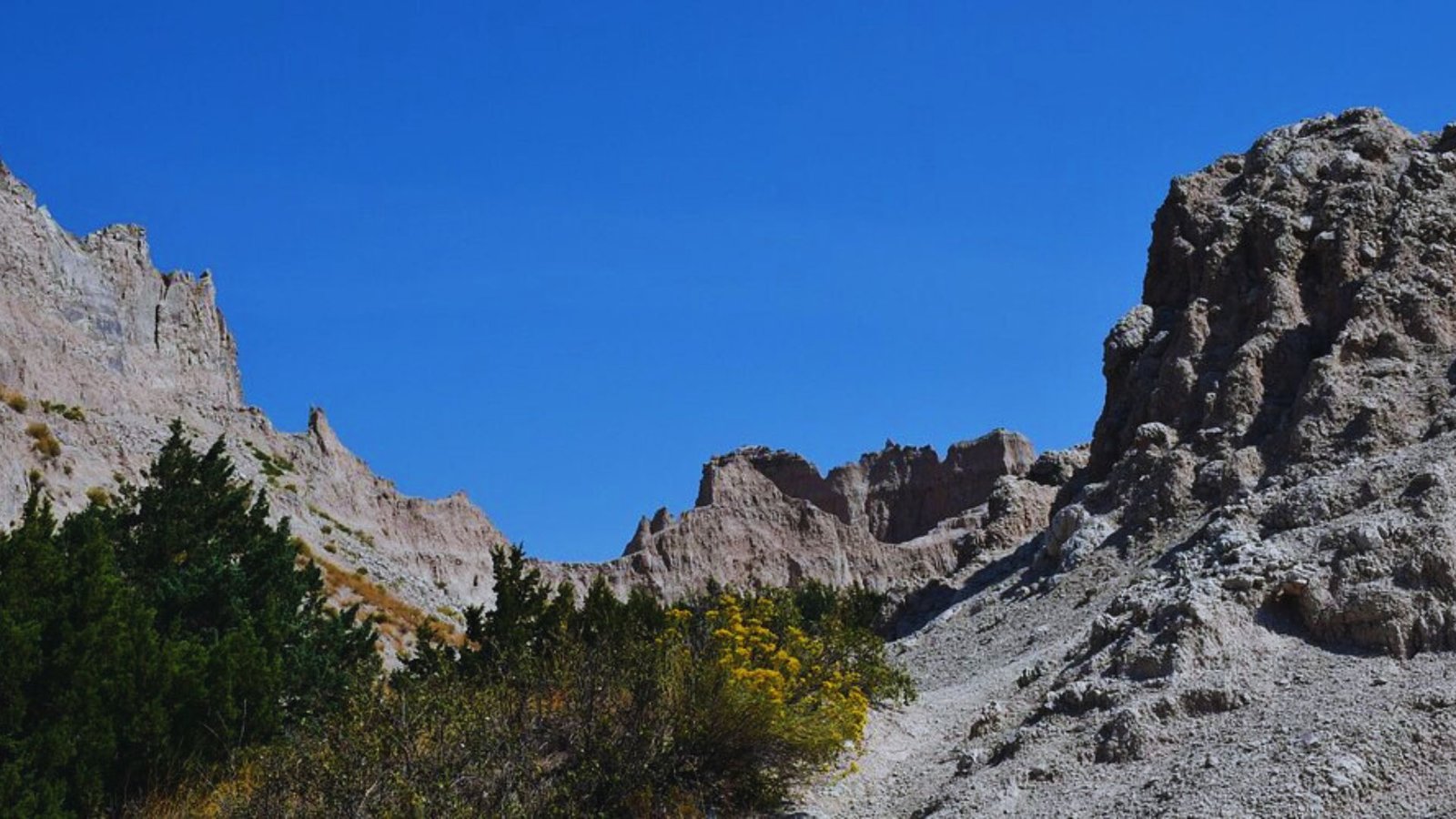 Scenic view of the Badlands, a popular hiking destination with rugged terrain and unique rock formations.
