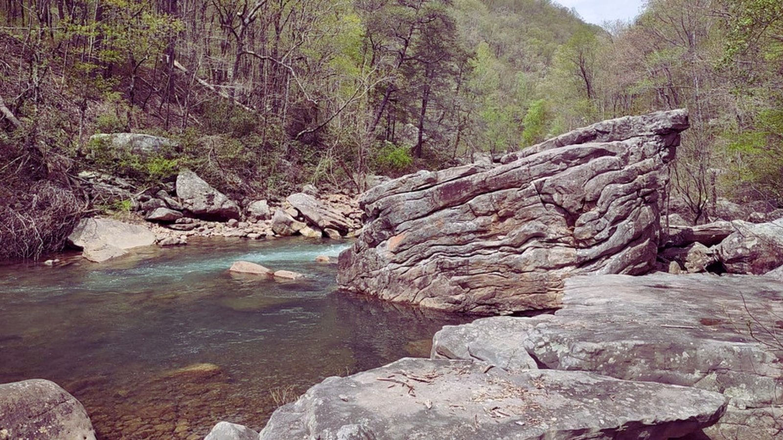 Serene photograph of Rock Creek, captured by Jason Kaufman for Stocksy United, showcasing natural beauty and tranquility.Serene photograph of Rock Creek, captured by Jason Kaufman for Stocksy United, showcasing natural beauty and tranquility.